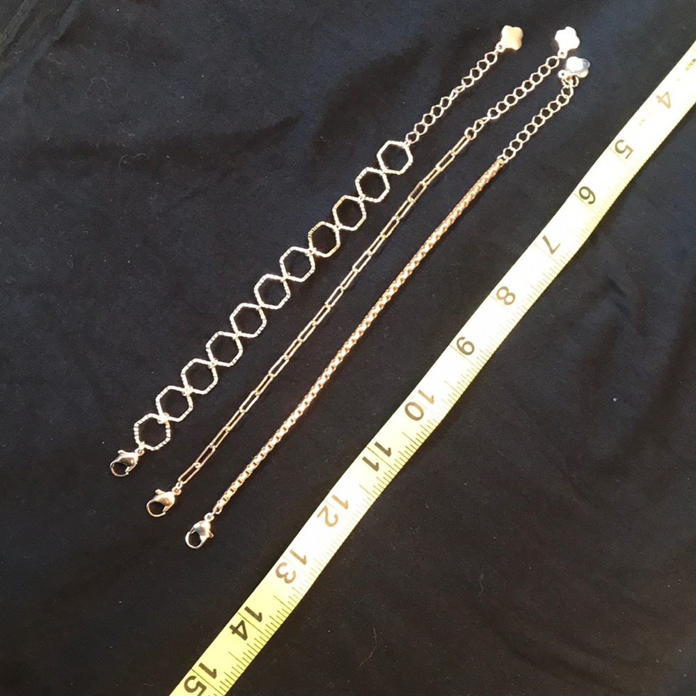 Set of three gold tone bracelets